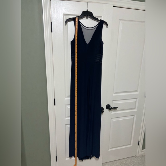 Navy blue fully lined ballgown with cutouts covered with navy, sheer mesh. - Picture 10 of 11